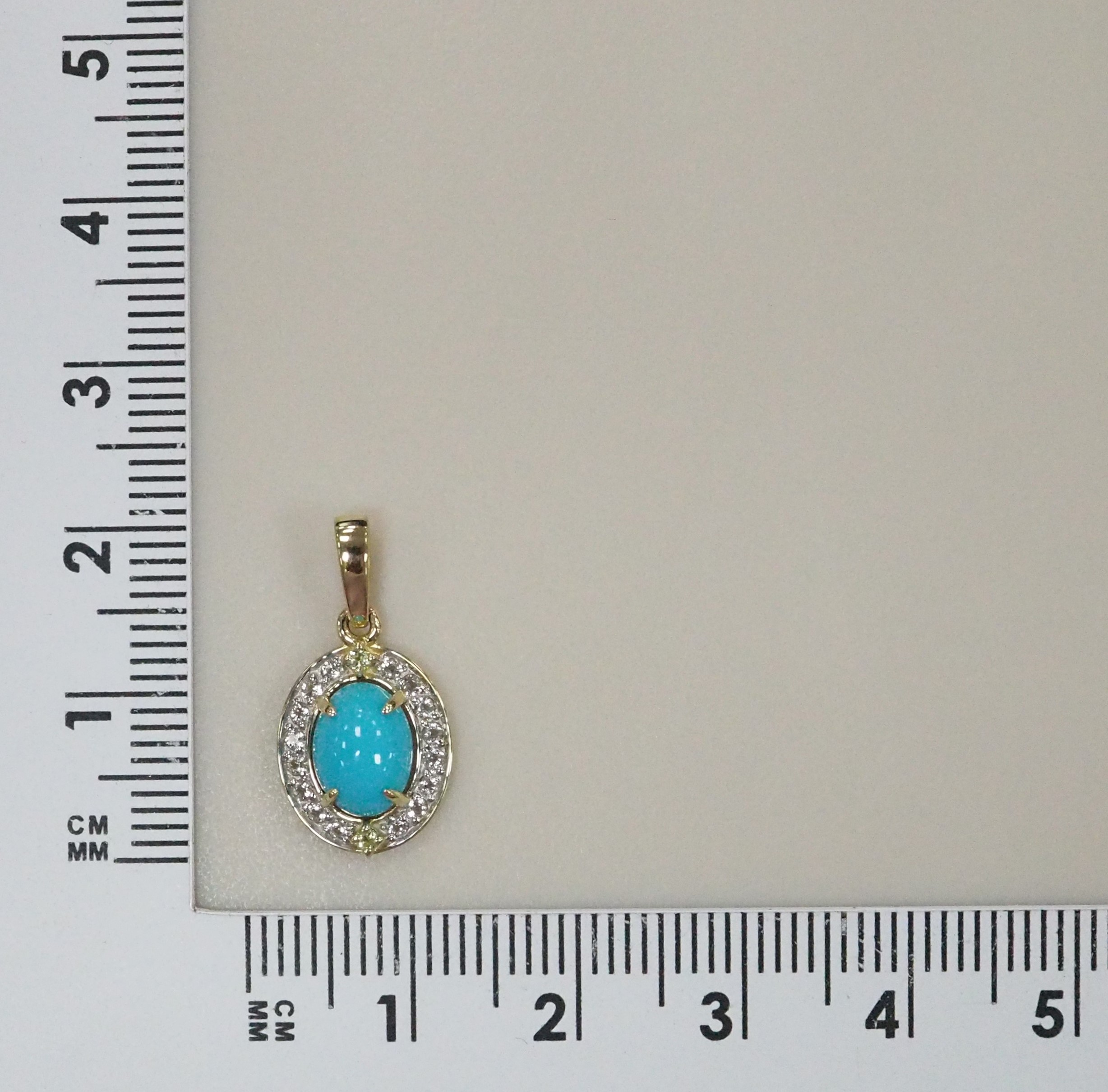 Подвеска из желтого золота с бирюзой